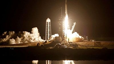 SpaceX capsule carrying 4 astronauts docks with International Space Station SpaceX capsule carrying 4 astronauts docks with International Space Station