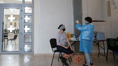 Ukraine to impose mandatory COVID-19 shots for doctors, municipal workers