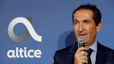 Exclusive-Altice founder Drahi seeks bigger stake in Britain's BT - sources