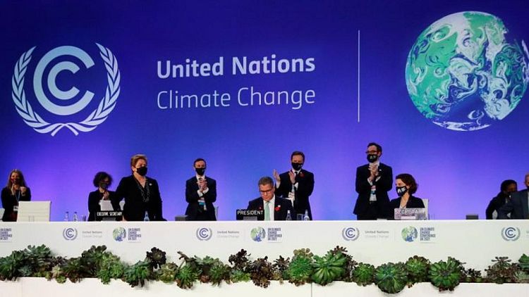 COP26 agrees deal aimed at averting climate catastrophe, after late drama