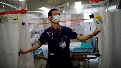 Japan prepares beds, booster shots in COVID-19 lull before winter Japan prepares beds, booster shots in COVID-19 lull before winter