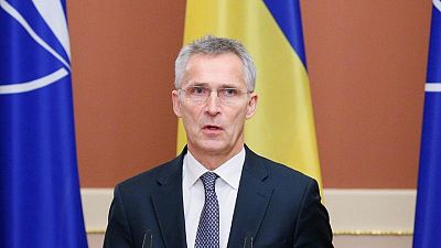 NATO chief warns Russia on troop build-up