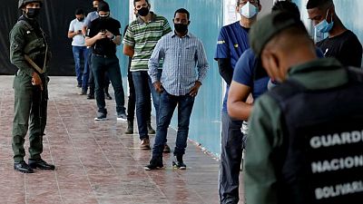 Venezuelans head to polls in regional, local elections as opposition returns