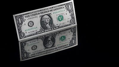 Analysis-Surging dollar awakens volatility in currency markets