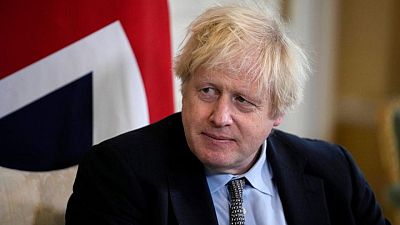 UK's Johnson sets out more measures to fight new COVID variant