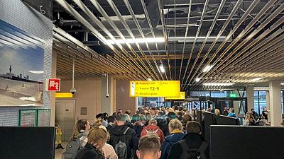 Passengers from South Africa face wait, COVID-19 testing in Amsterdam Passengers from South Africa face wait, COVID-19 testing in Amsterdam