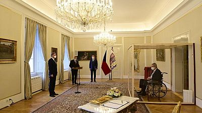 Czech president appoints Fiala as PM in ceremony behind glass