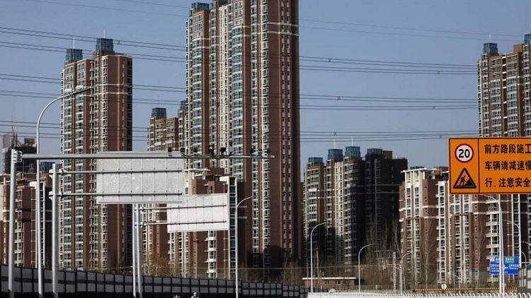 China's property woes worsen as home prices slip in November-survey