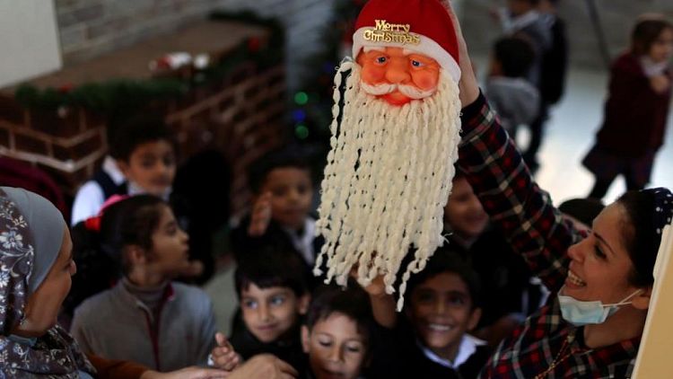 Christmas cheer at Gaza Catholic school as war damage repairs go on