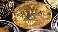 Bitcoin tumbles 5% after a weekend cryptocurrency crash brought on by investors' Omicron fears