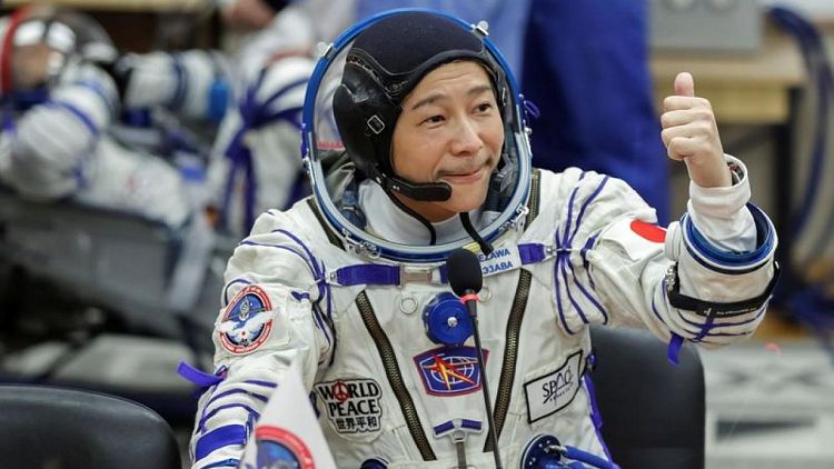 Japanese billionaire Maezawa blasts off to International Space Station