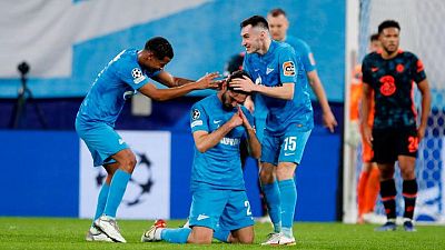 Soccer-Chelsea lose top spot after 3-3 draw at Zenit