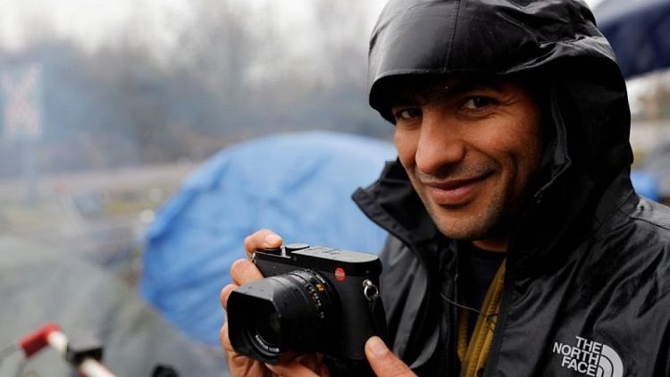 In France, Afghan refugee photographs journeys of fellow migrants