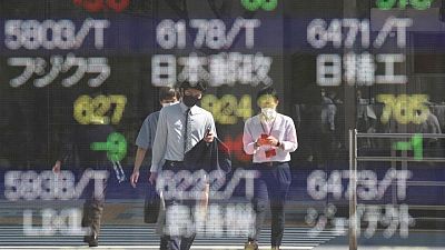 Asian shares slip ahead of key U.S. inflation data