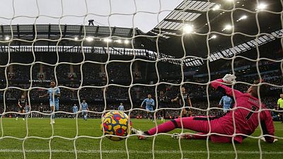 Soccer-Premier League top three need penalties to scrape wins