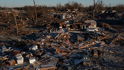 Hope amid the rubble: Kentucky tornado death toll could fall, company says