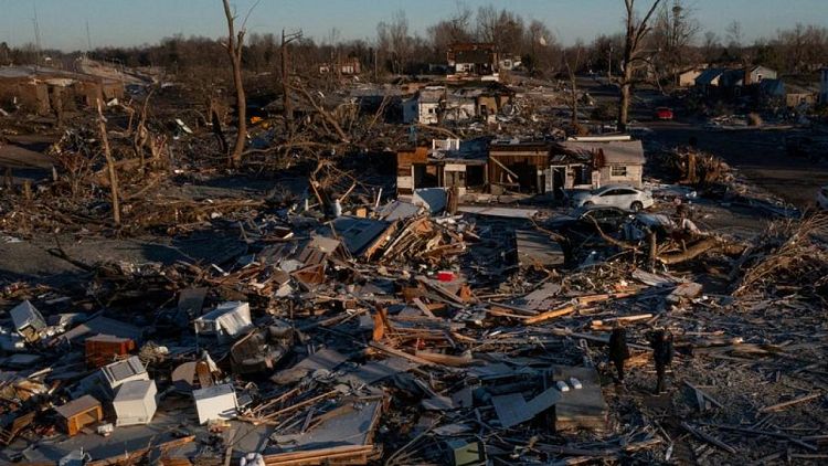 Hope amid the rubble: Kentucky tornado death toll could fall, company says