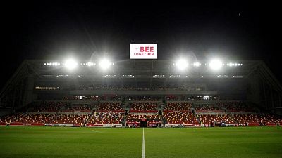 Soccer-Man United's league game at Brentford postponed due to COVID-19 Soccer-Man United's league game at Brentford postponed due to COVID-19