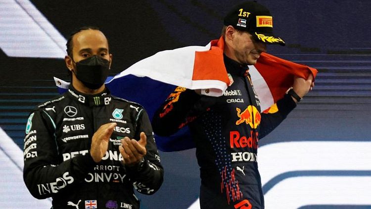 Motor racing-Hamilton told team on radio race was 'manipulated'