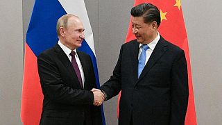الرئيسان الصيني شي جين بينغ و الروسي فلاديمير بوتين