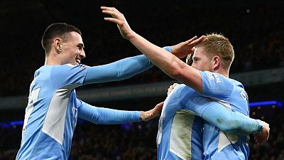 Soccer-Man City hammer Leeds 7-0 for seventh straight win