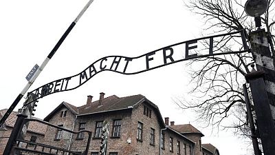 'Shameful': Auschwitz-style banner at Polish COVID vaccine protest condemned 'Shameful': Auschwitz-style banner at Polish COVID vaccine protest condemned