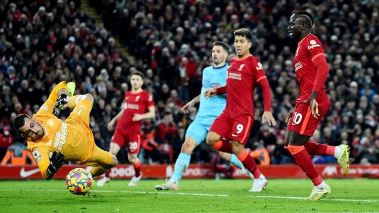 Soccer-COVID-hit Liverpool bounce back to beat Newcastle 3-1
