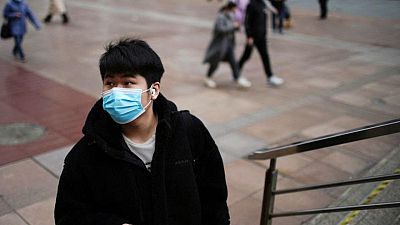 الصين تسجل 125 إصابة جديدة بكوفيد-19