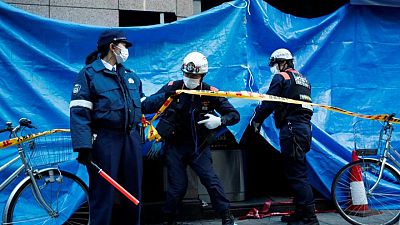 Japan investigators believe only escape route blocked in fatal clinic fire Japan investigators believe only escape route blocked in fatal clinic fire