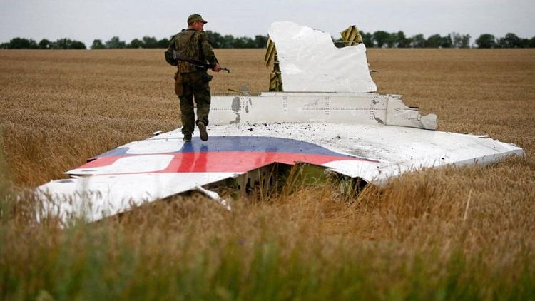 Suspects in Dutch trial 'fully responsible' for MH17 downing, prosecution says