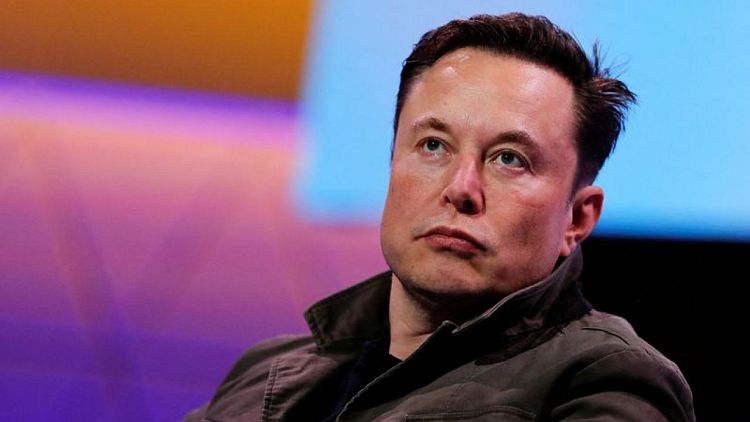 Factbox-Tesla's Musk sells shares worth over $14 billion
