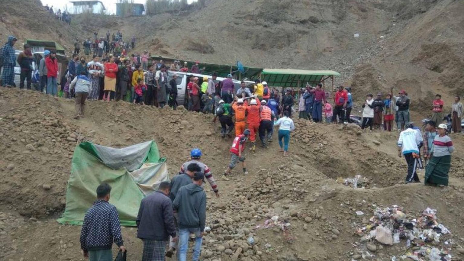 Three bodies found, but scores buried by landslide at Myanmar jade mine