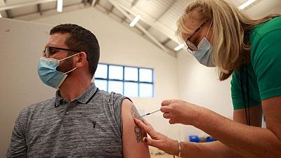 UK COVID-19 infections dip under 100,000 mark UK COVID-19 infections dip under 100,000 mark