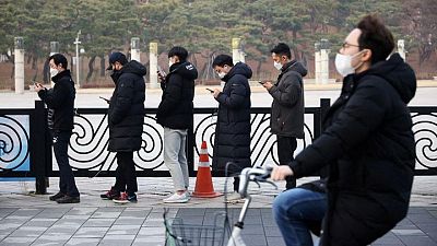 South Korea to extend curbs amid Omicron surge, serious COVID-19 cases