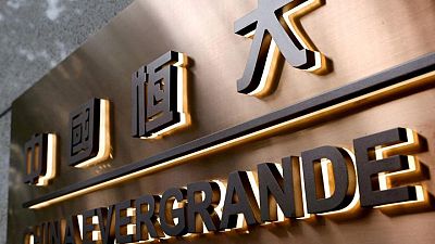 China Evergrande shares to halt trading
