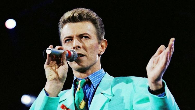 Catalog of late rocker David Bowie sold to Warner Music