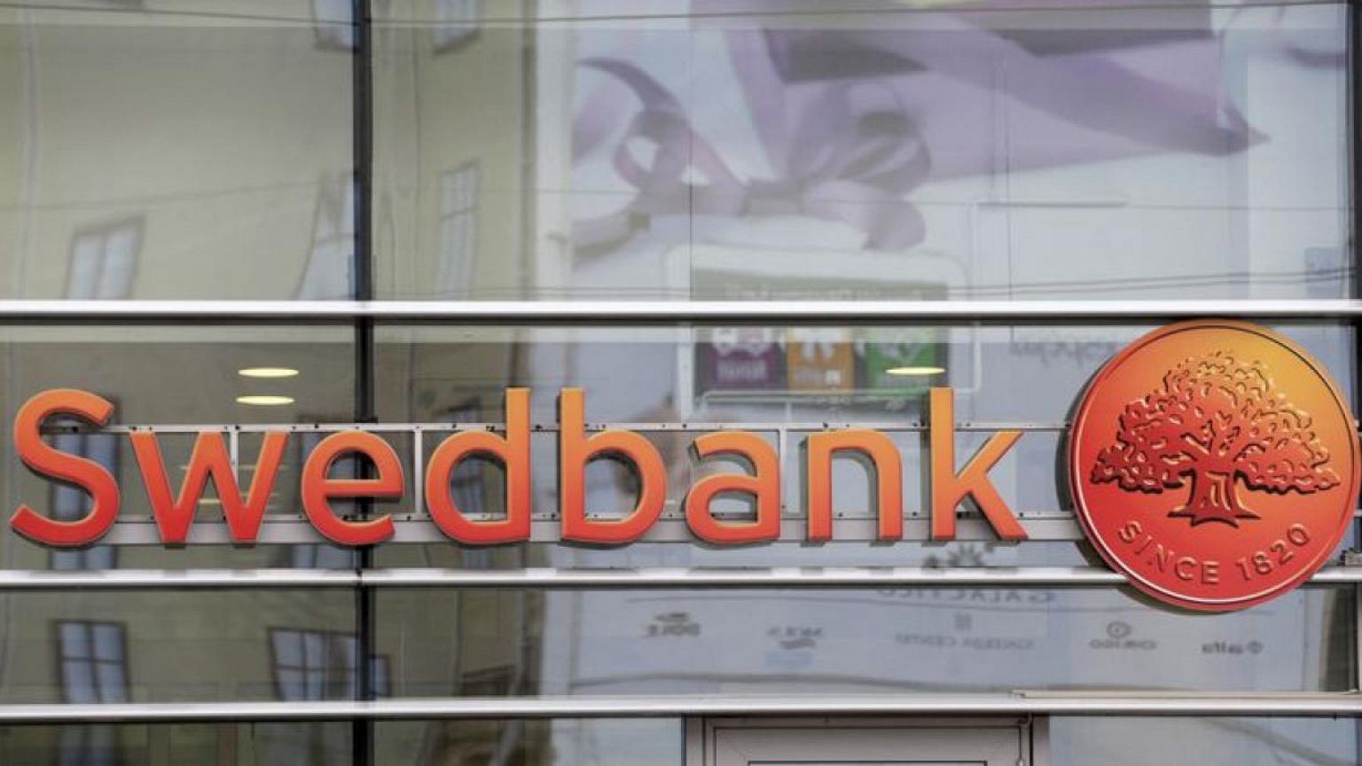 Swedish economic crime authority charges former Swedbank CEO