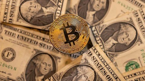 Bitcoin and other cryptos slump in value after hawkish US Federal Reserve minutes released