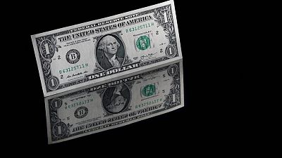 Dollar riding high on hike bets ahead of payrolls report