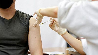 Omicron spike in most vaccinated German state heralds nationwide surge