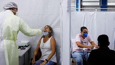 Weak testing, data outage leave Brazil 'in the dark' as Omicron advances Weak testing, data outage leave Brazil 'in the dark' as Omicron advances