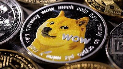 Tesla merchandise buyable using dogecoin, Musk says in tweet Tesla merchandise buyable using dogecoin, Musk says in tweet
