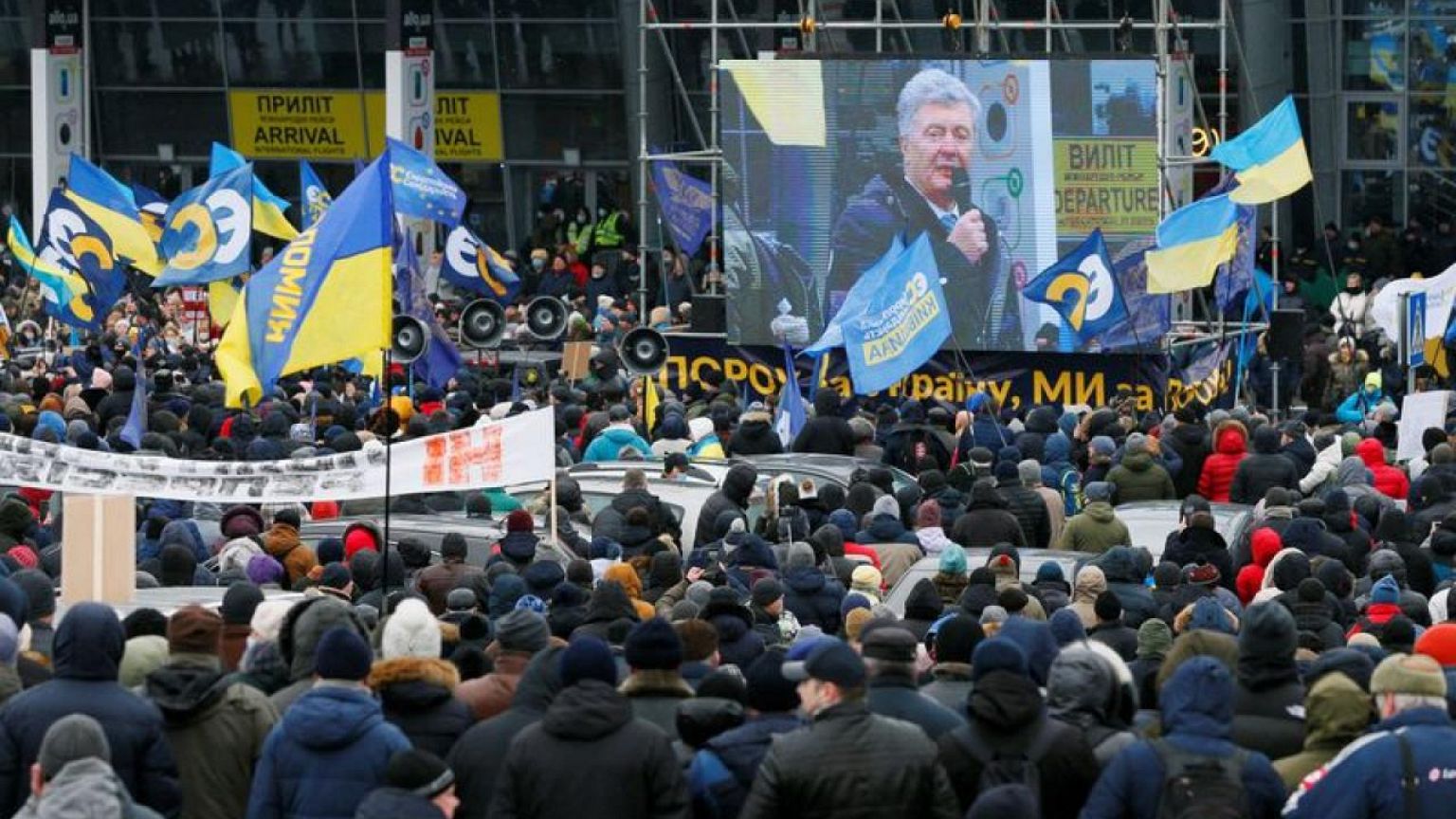 Former Ukrainian president lands in Kyiv to face treason case