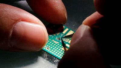 China's industry ministry expects tight chip supply for relatively long period