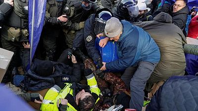 Ukrainian police scuffle with Poroshenko supporters as Blinken visits