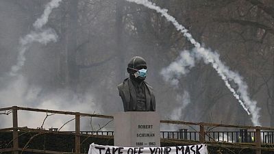 Belgian police fire water cannon, tear gas during COVID curbs protest Belgian police fire water cannon, tear gas during COVID curbs protest