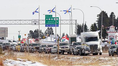 Truckers fighting government vaccine mandate march to Canadian capital