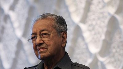 Former Malaysia PM Mahathir's condition improving, to remain in hospital