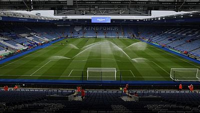 Soccer-Premier League says minimum four COVID-19 cases needed for fixture postponement