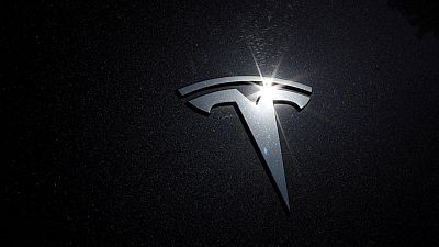 Tesla sees supply chain issues throughout 2022, posts record revenue